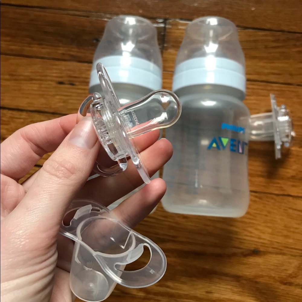 NWOT lot of 2 bottles + 2 pacifiers